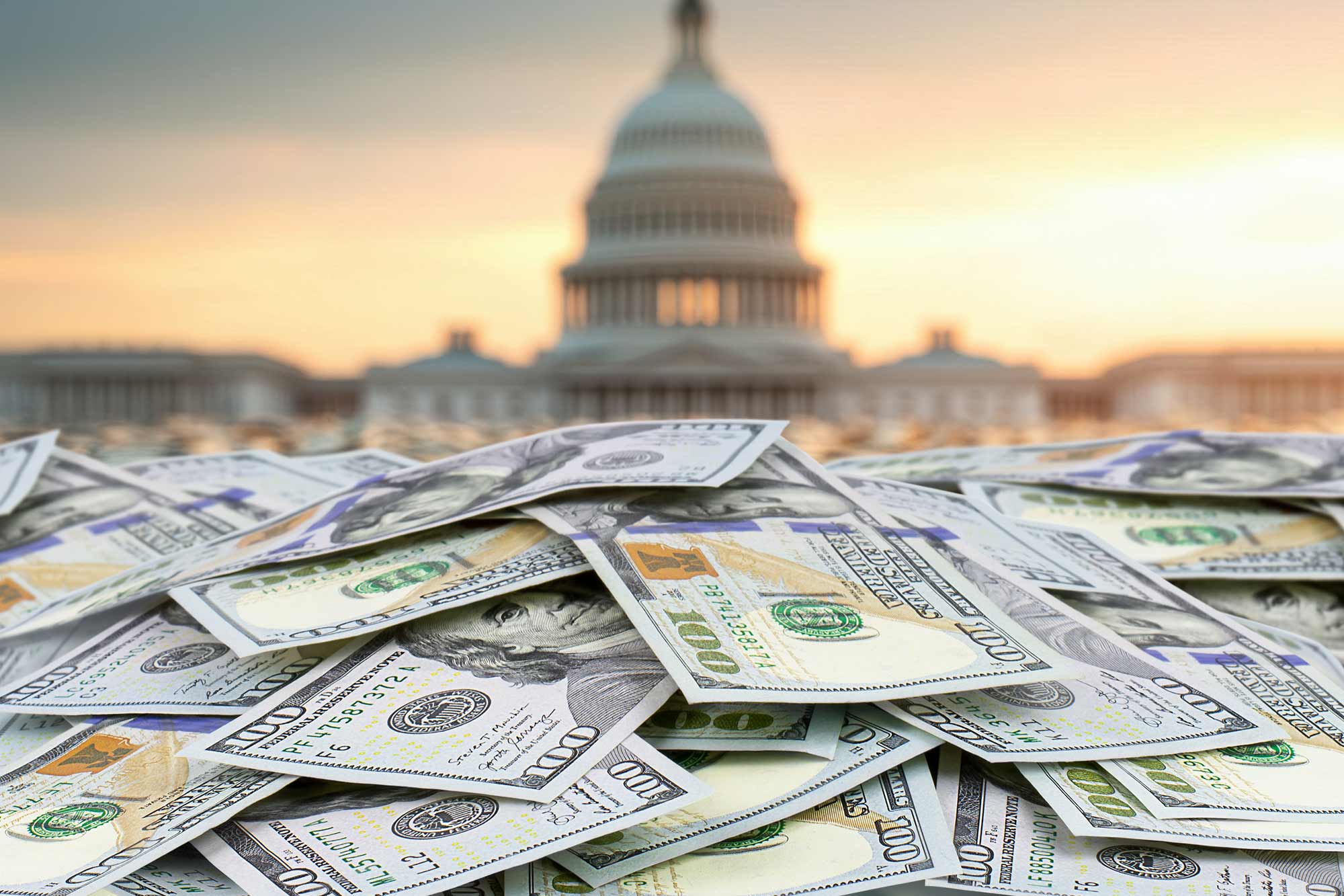 money stacked in front of capitol