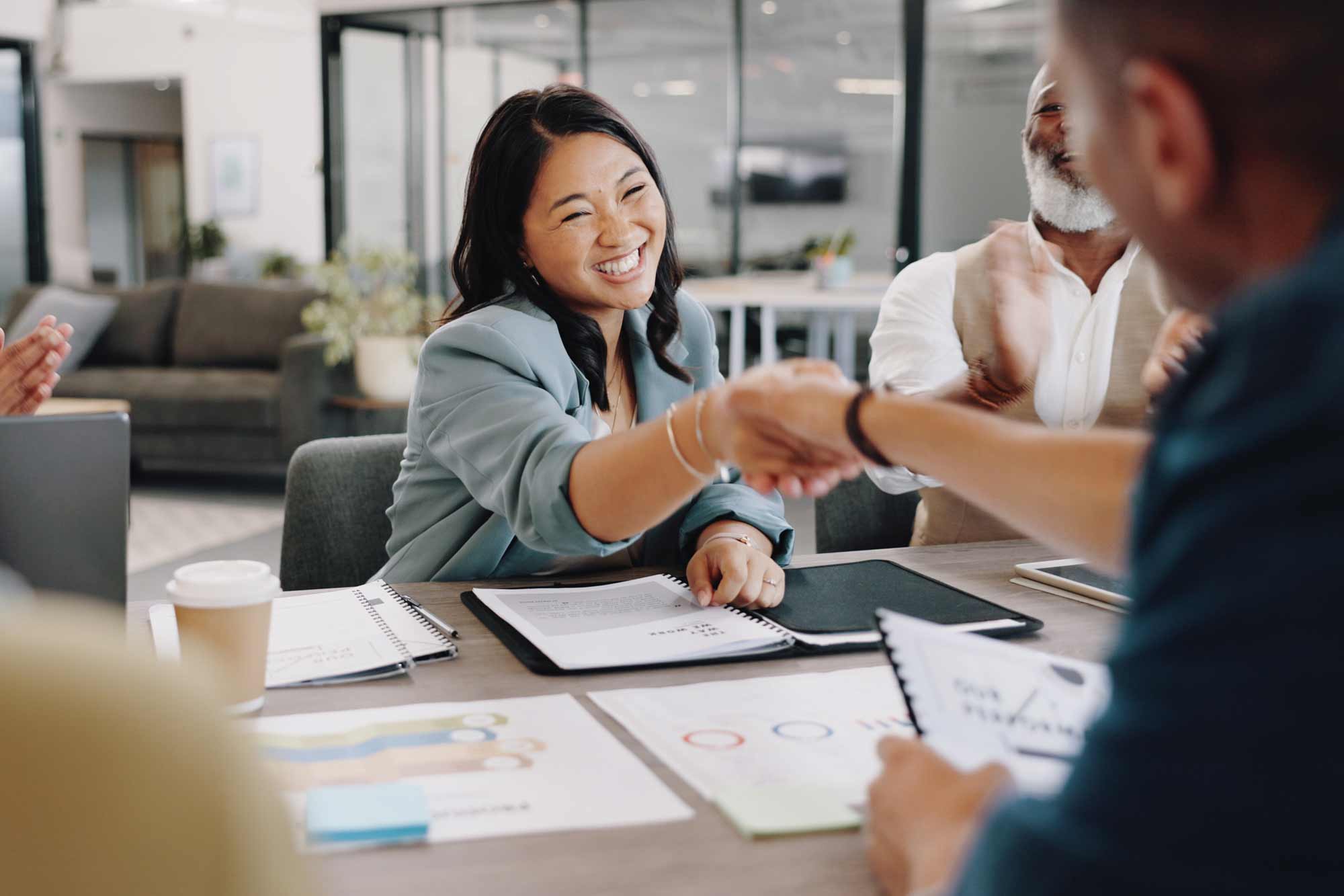 woman-greeting-employer-office